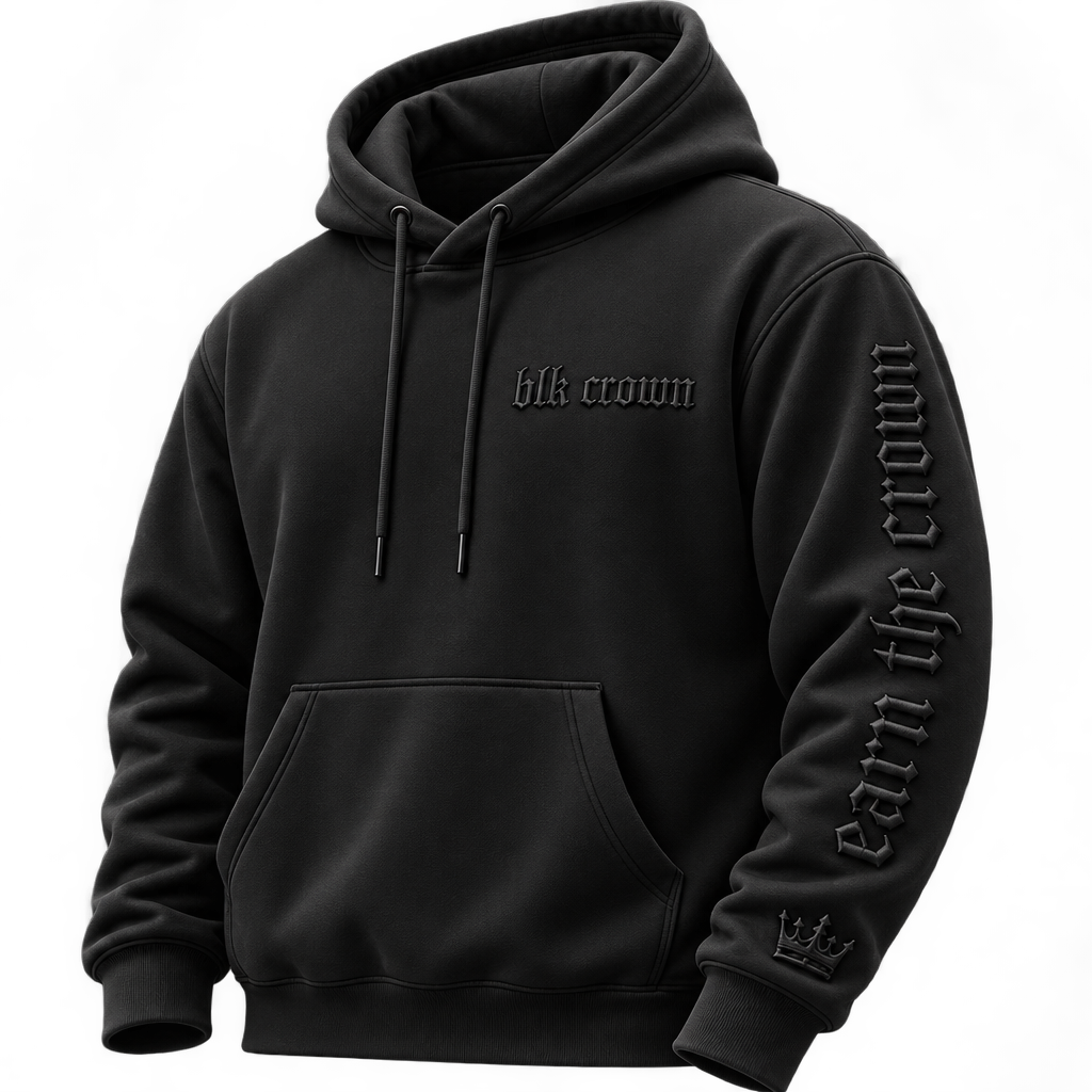 A black pullover hoodie with 'blk crown' printed on the chest and 'earn the crown' in gothic-style lettering down the right sleeve, shown on a plain white background.