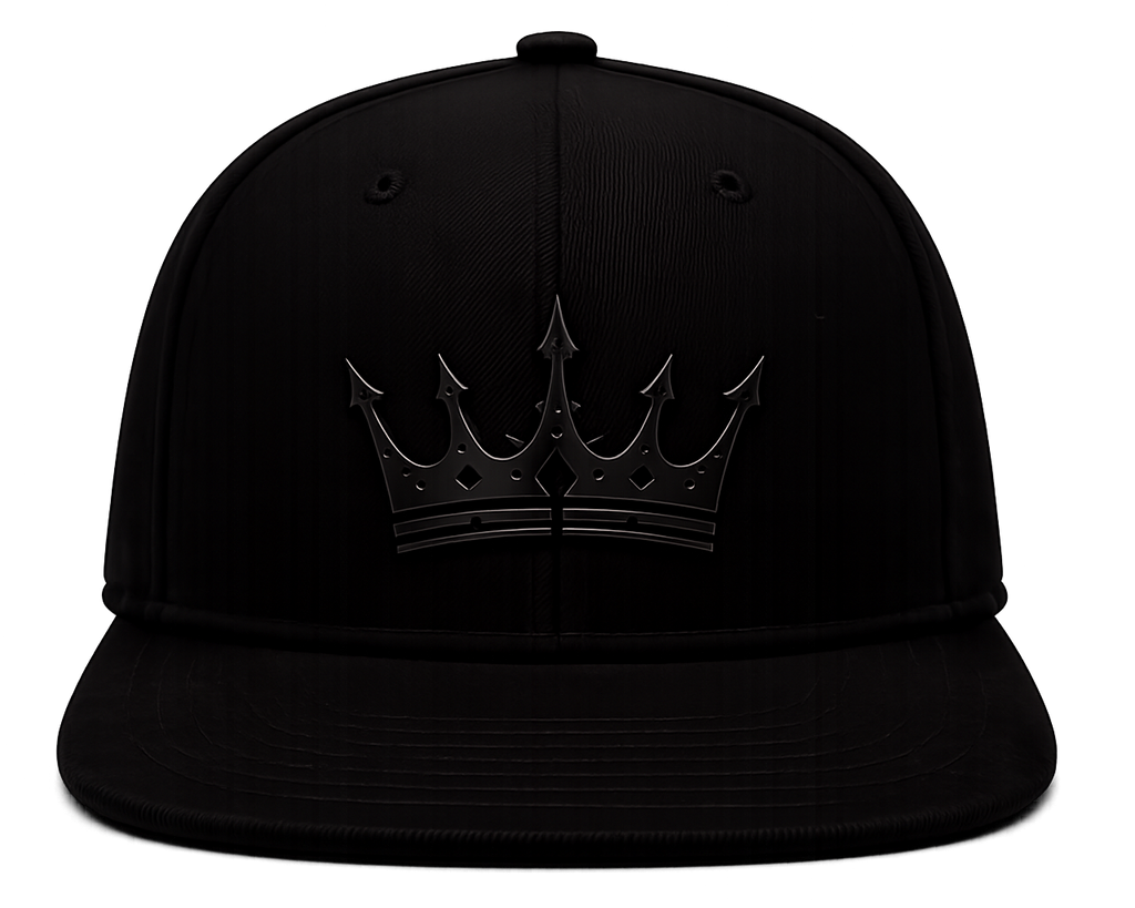 A black flat-brim baseball cap featuring a tonal black crown patch with a stylized crown emblem, shown against a plain white background.