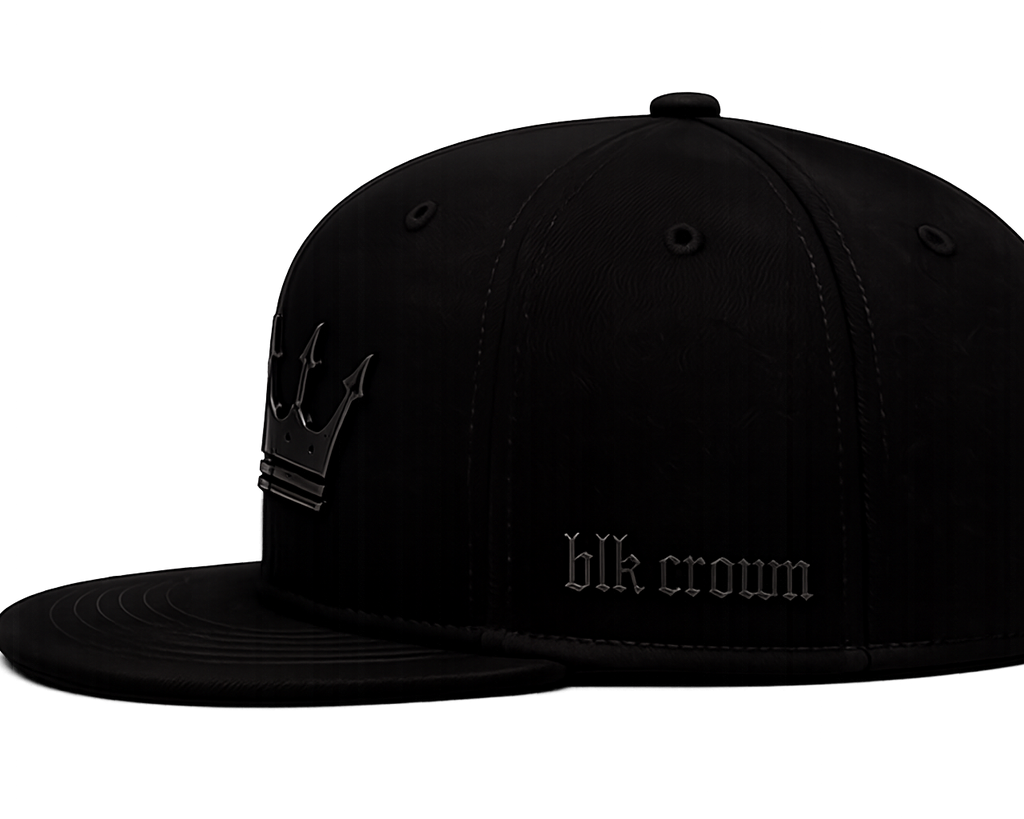 A black flat-brim snapback cap with a tonal black crown embroidery featuring a crown graphic and the text 'blk crown' on the side, shown against a plain white background.