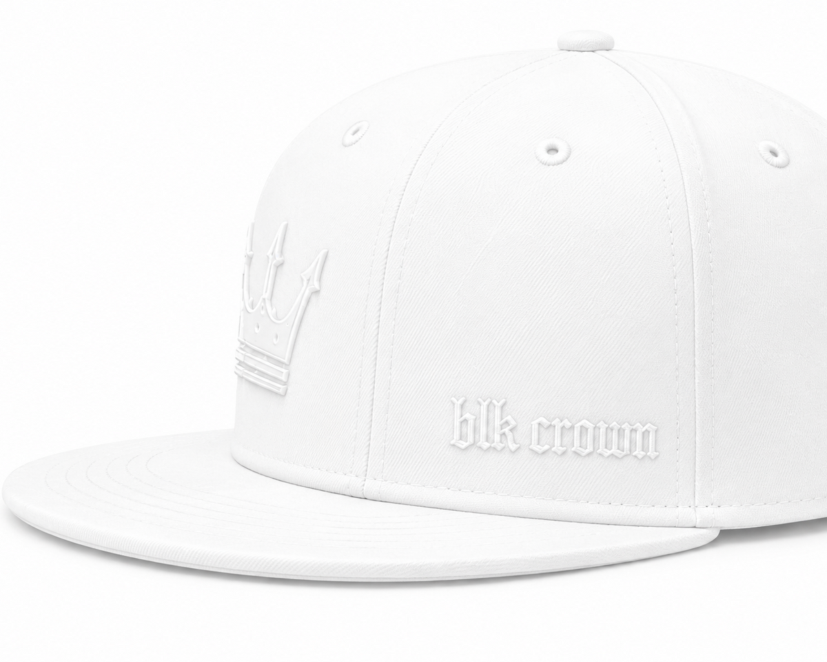 A white structured snapback cap with a flat brim, featuring an embossed crown logo on the front left and 'blk crown' embroidered in gothic font on the front right, shown against a plain white background.